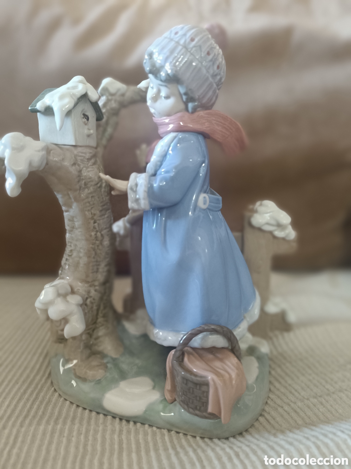 Antiquit&auml;ten: Figura Lladr&oacute; de porcelana. Ni&ntilde;a de invierno