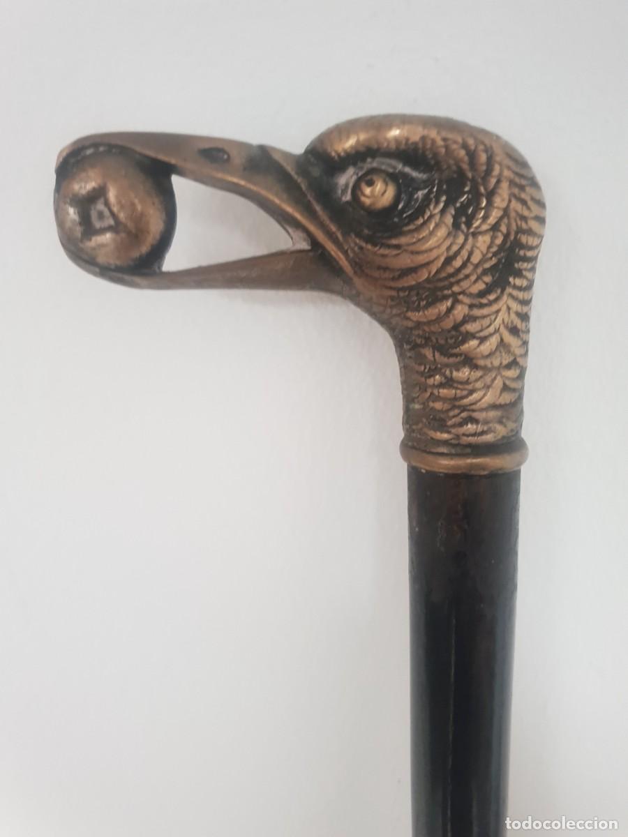 Antig&uuml;edades: Baston cabeza pajaro metal - Foto 1