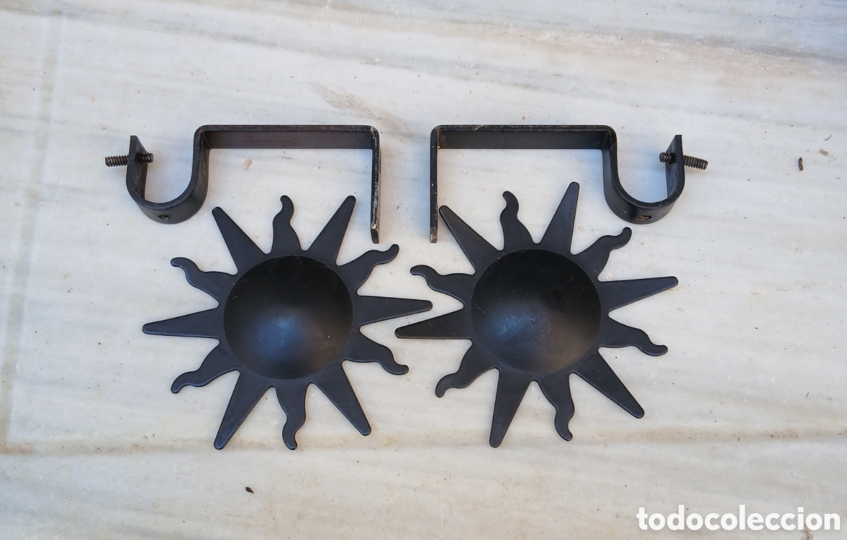 Antig&uuml;edades: 2 soportes barra cortina, con dise&ntilde;o de Sol