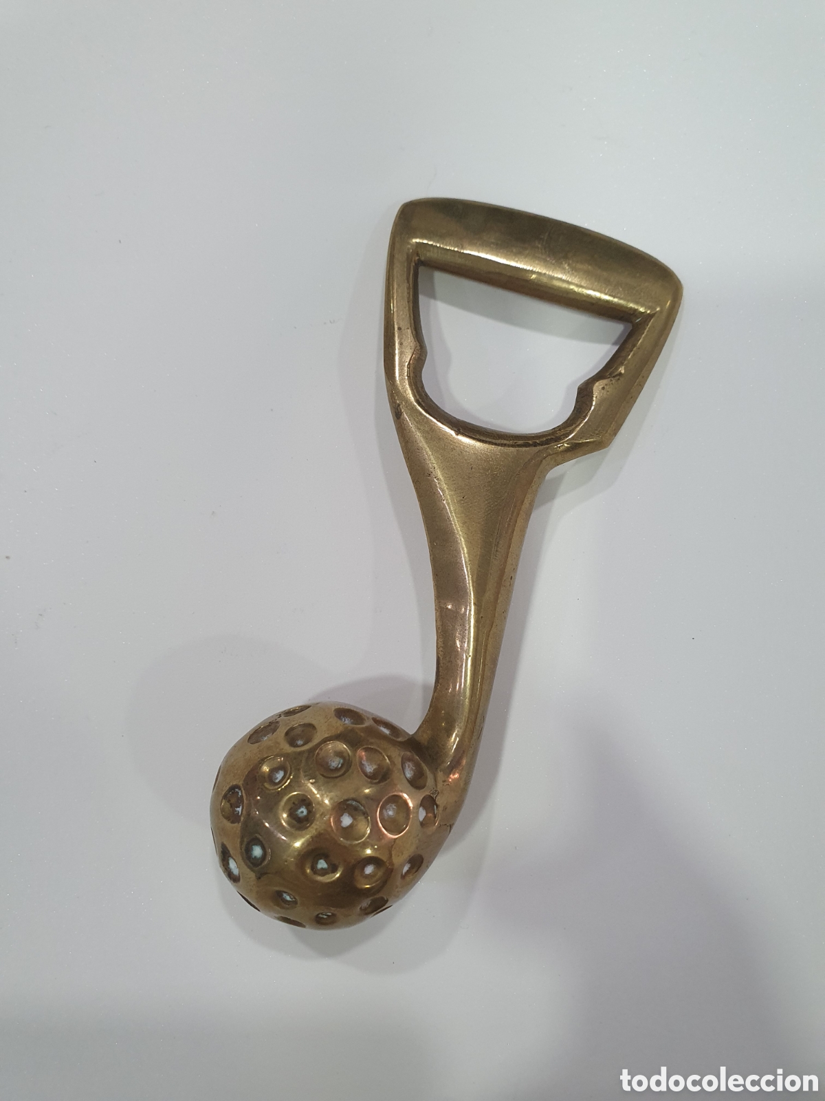Antiquit&auml;ten: Abrechapas pelota de golf en bronce. Brutalista. (L127)