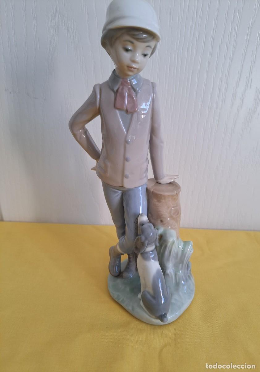 Antig&uuml;edades: FIGURA DE NI&Ntilde;O CON PERRO NAO DE LLADRO 23 CM