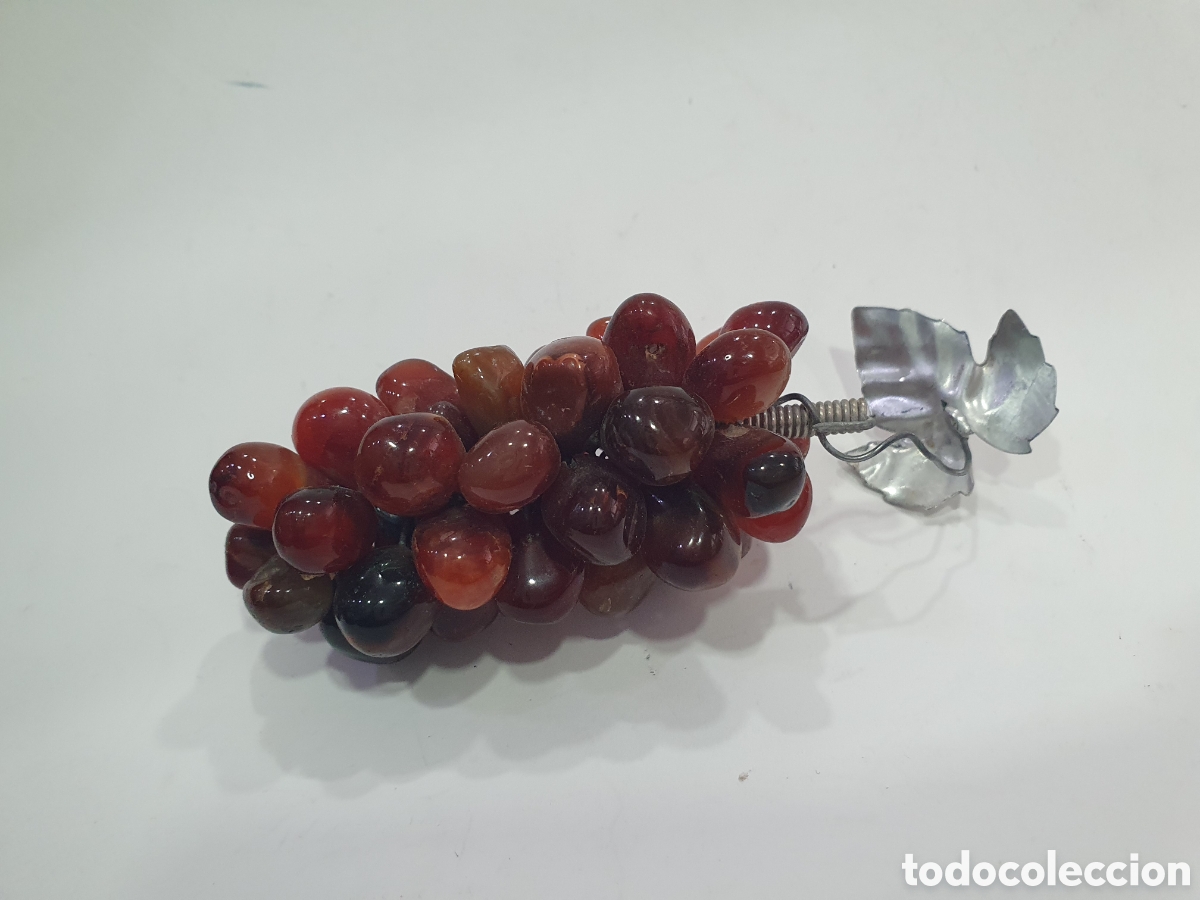 Antiquit&auml;ten: Racimo de uvas en piedra. (L120)
