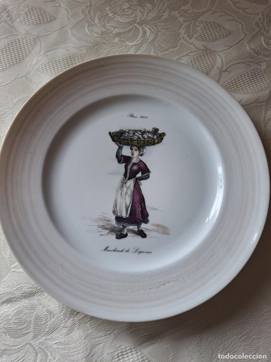 Antig&uuml;edades: Plato llano de porcelana atelier irene kleckin- vendedora de legumbres.