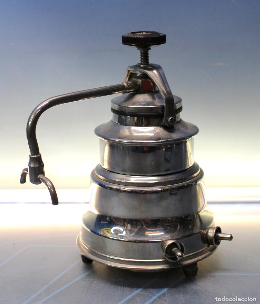Antig&uuml;edades: Antigua cafetera Solac de alcohol o el&eacute;ctrica. Incluye manual.