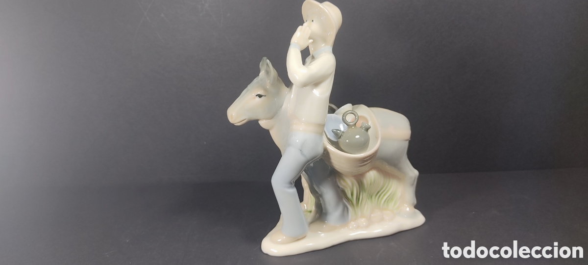 Antiguidades: ENTRA&Ntilde;ABLE CACHARRERO CON MULA. FIGURA EN PORCELANA MARCA CLEAN