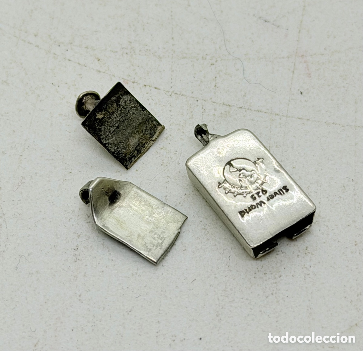 Antig&uuml;edades: Antiguos Adornos de Plata de Ley