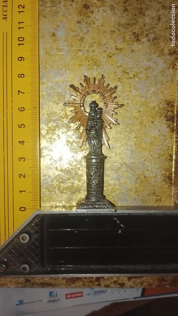 Antig&uuml;edades: metal columna y rafaga virgen del pilar patrona de zaragoza