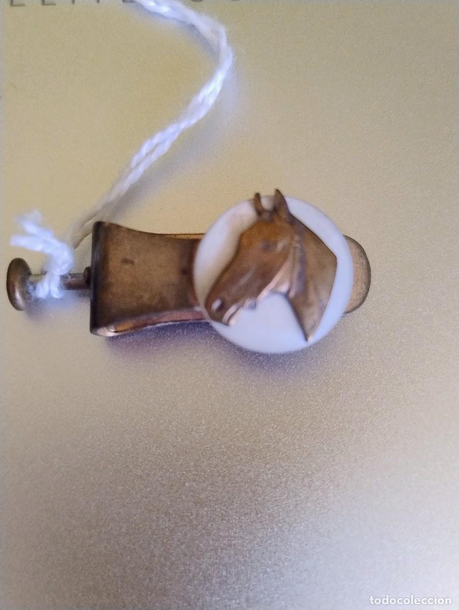 Antig&uuml;edades: Pisacorbatas o sujeta billetes Caballo.