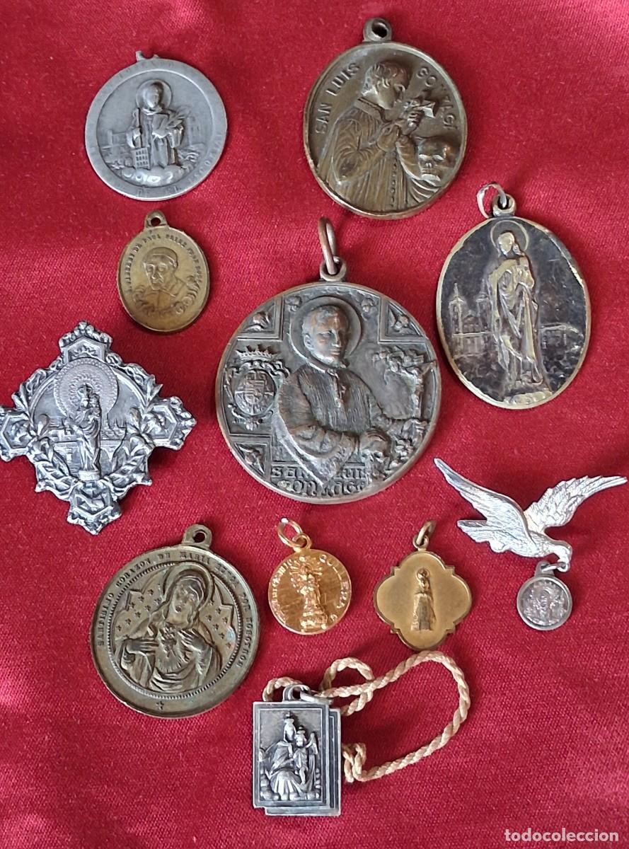 Antig&uuml;edades: Lote de 11medallas relugiosas antiguas