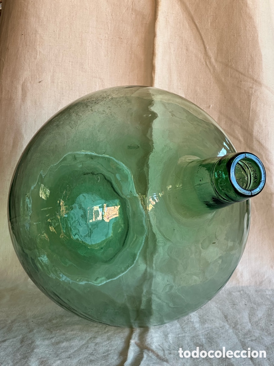 Antig&uuml;edades: Damajuana o garrafa de vidrio. Botella de cristal.