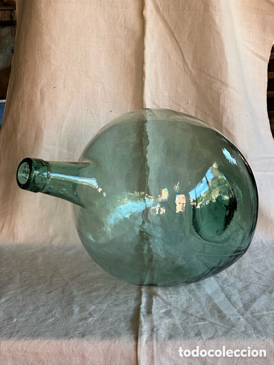 Antig&uuml;edades: Garrafa o damajuana antigua de vidrio. Botella de cristal.