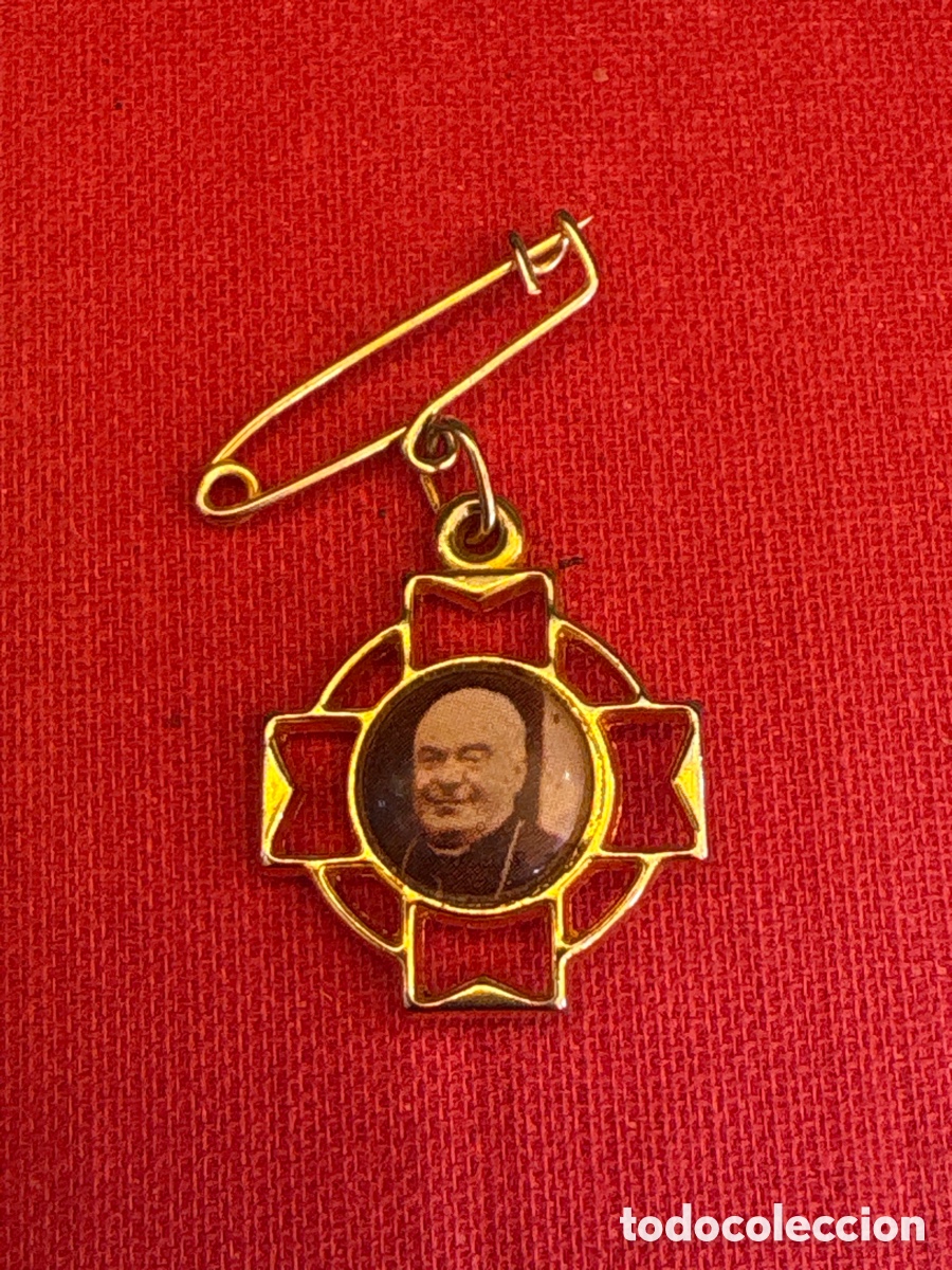Antig&uuml;edades: Medalla con reliquia de Ex Indumentis
