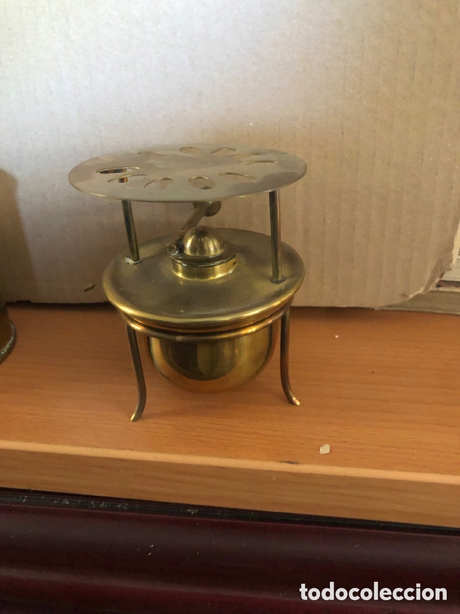 Antig&uuml;edades: antiguo mechero de lat&oacute;n de laboratorio