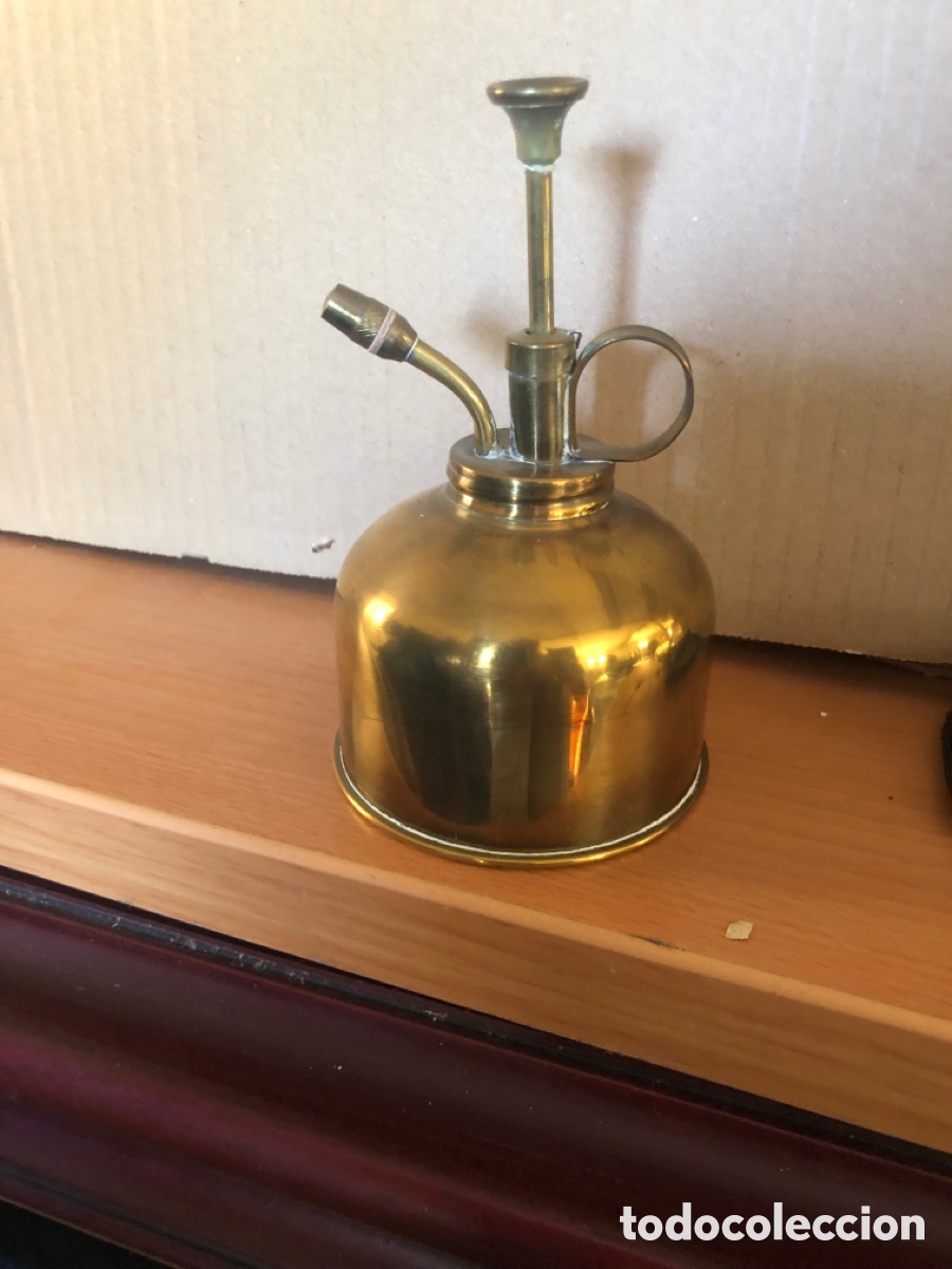 Antig&uuml;edades: pulverizador de lat&oacute;n