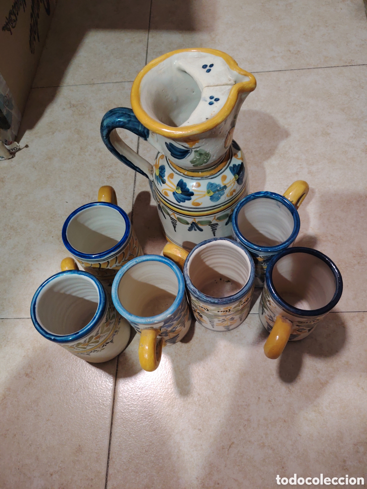 Antig&uuml;edades: Juego de jarra y 6 vasos Talavera mave