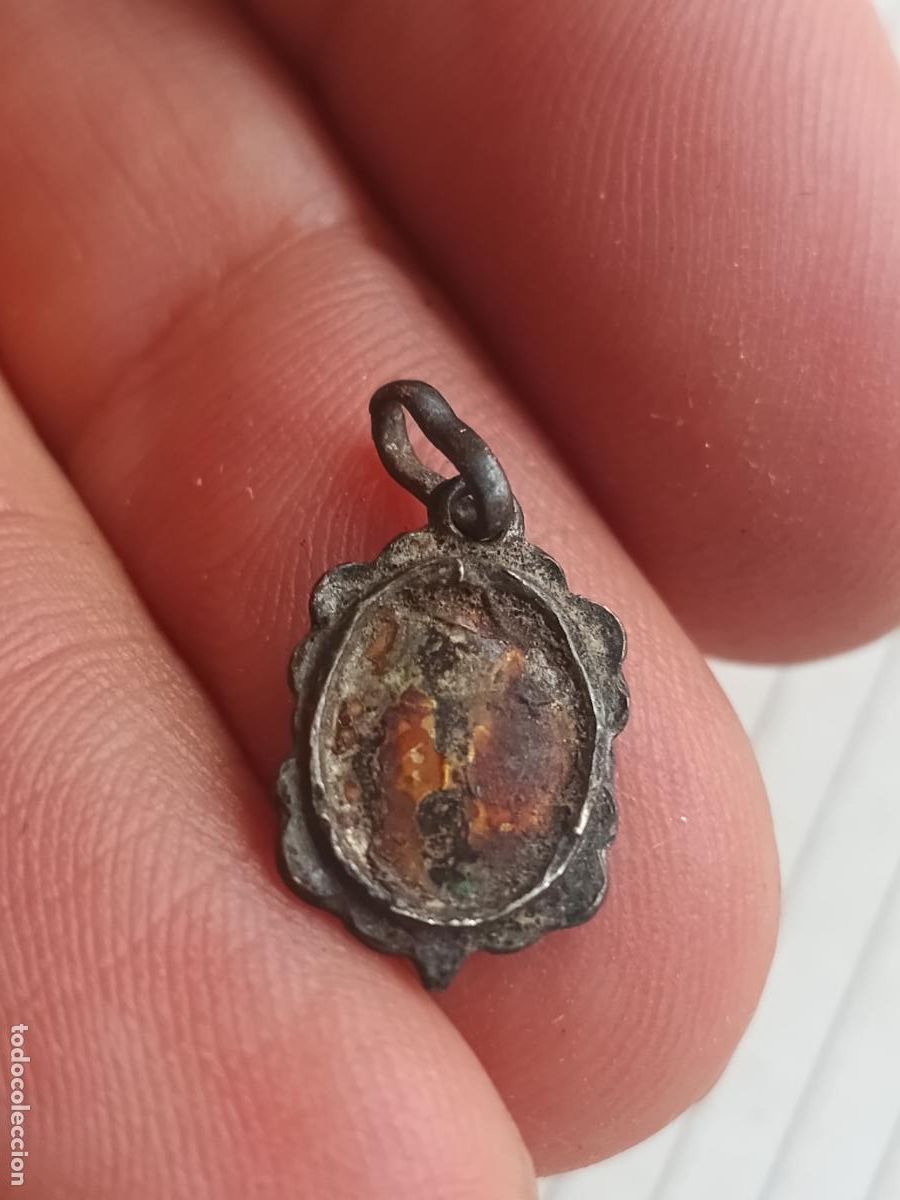 Antig&uuml;edades: Medallita antigua de plata contrastada