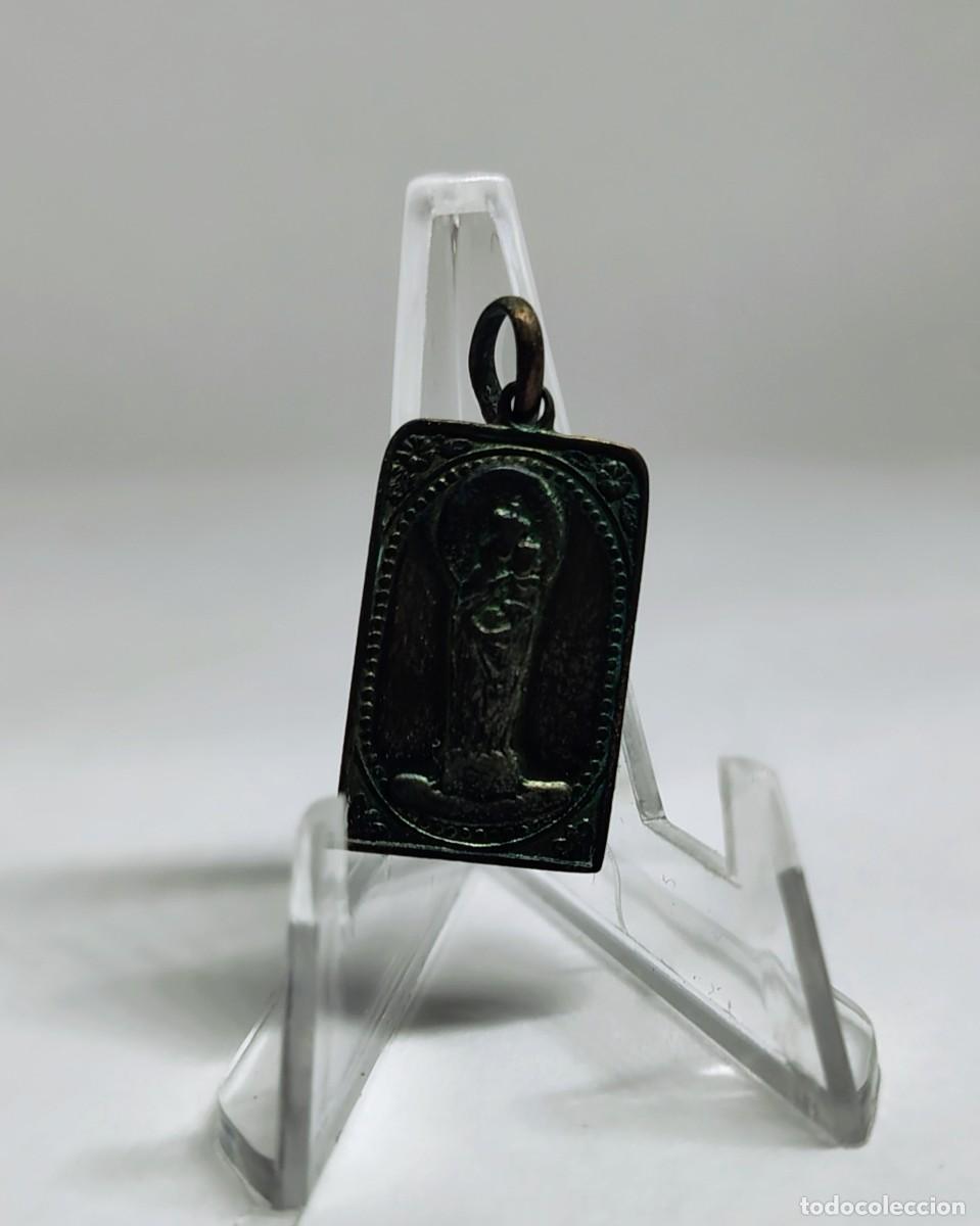 Antig&uuml;edades: Medalla religiosa / Colgante: NUESTRA SE&Ntilde;ORA VIRGEN DEL PILAR. M426