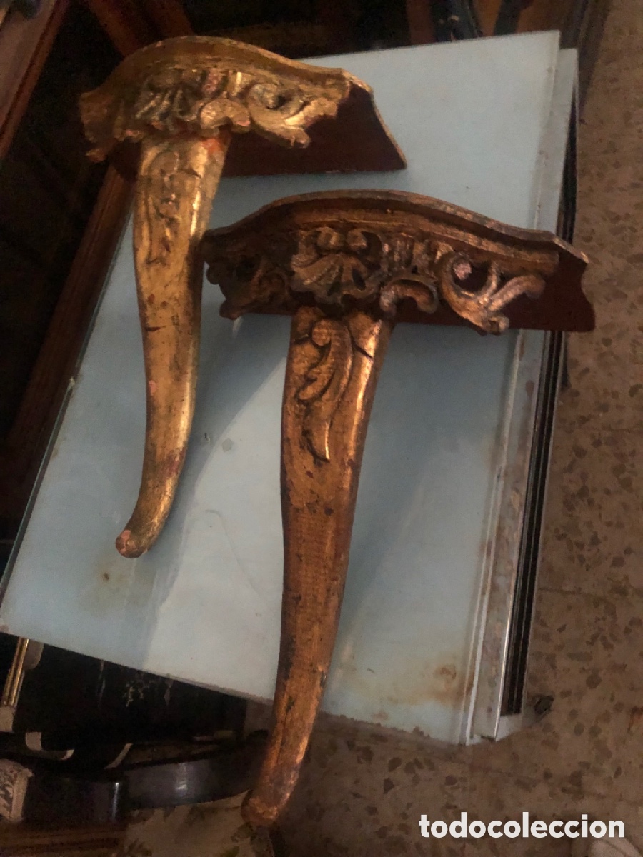 Antig&uuml;edades: 2 M&eacute;nsulas-consolas del S. XIX , en madera tallada y dorada
