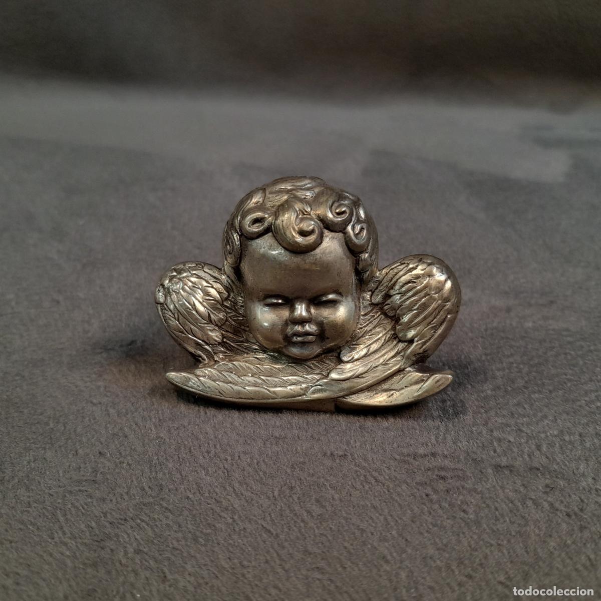 Antig&uuml;edades: CABEZA DE QUERUB&Iacute;N EN PLATA. SIGLO XX