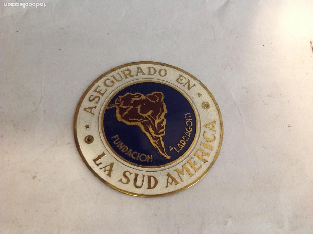 Antig&uuml;edades: Placa circular met&aacute;lica de metal esmaltado