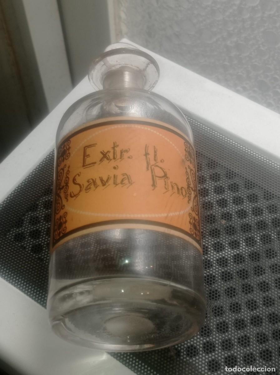 Antig&uuml;edades: frasco de farmacia antiguo de vidrio transparente.Extr. fl. Savia Pino