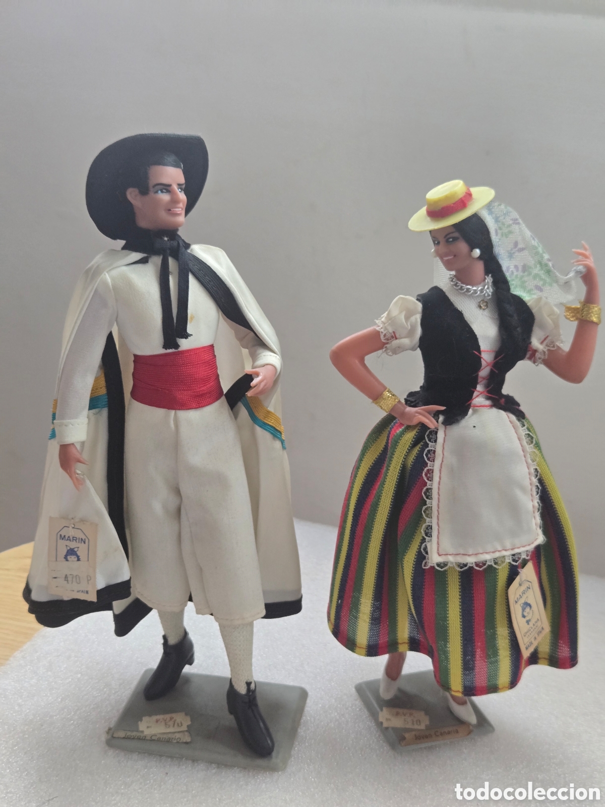 Antig&uuml;edades: Mu&ntilde;ecos Mar&iacute;n canarios con etiquetas originales.