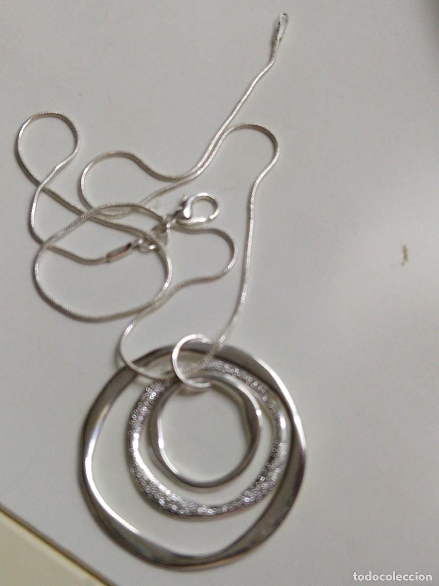 Antig&uuml;edades: Cadenita de plata con colgante en acero