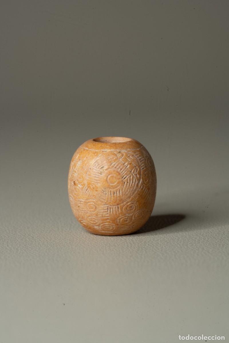 Antig&uuml;edades: Cuenta de jade de la cultura de Liangzhu del periodo Neol&iacute;tico de China (3300&ndash;2300 a. C.)