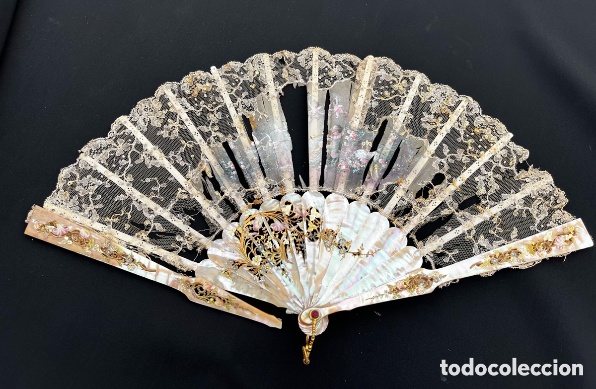 Antig&uuml;edades: Antiguo abanico de n&aacute;car motivos florales.