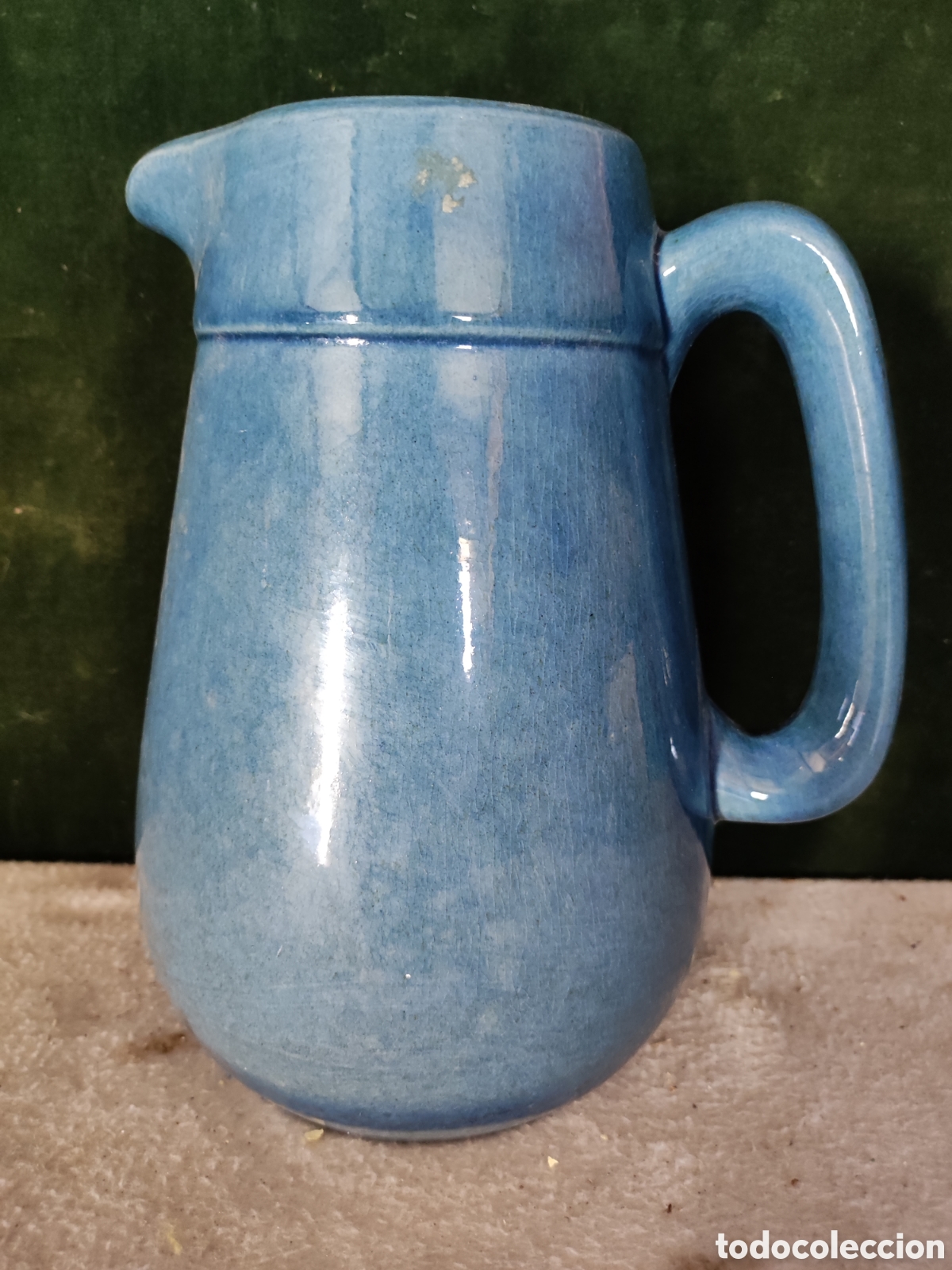 Antig&uuml;edades: Jarra de cer&aacute;mica vidriada en azul