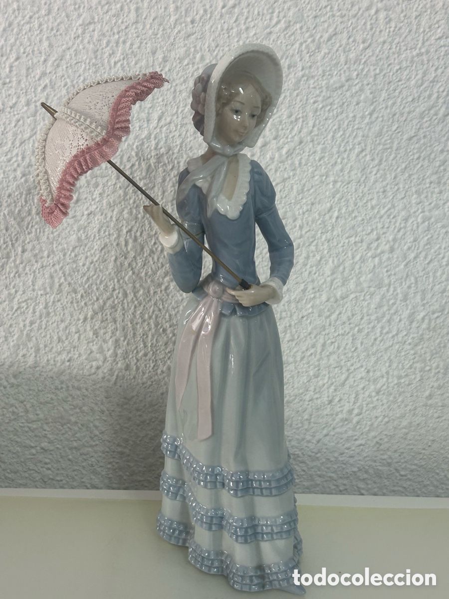 Antig&uuml;edades: Figura Lladr&oacute; porcelana mujer paraguas a&ntilde;os 70