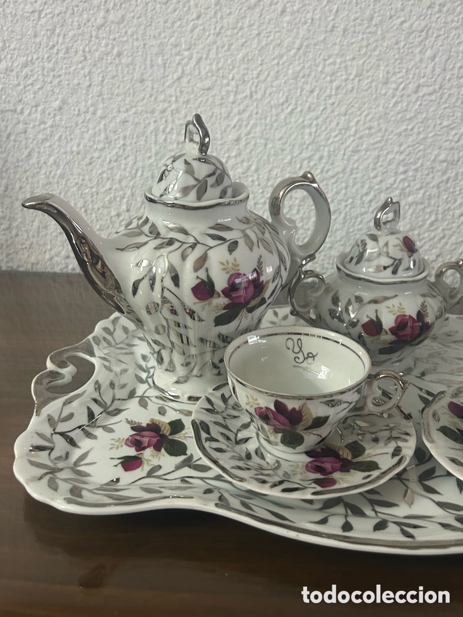 Antiguidades: Juego de caf&eacute;/t&eacute; de porcelana con bandeja, 9 piezas decorado floral