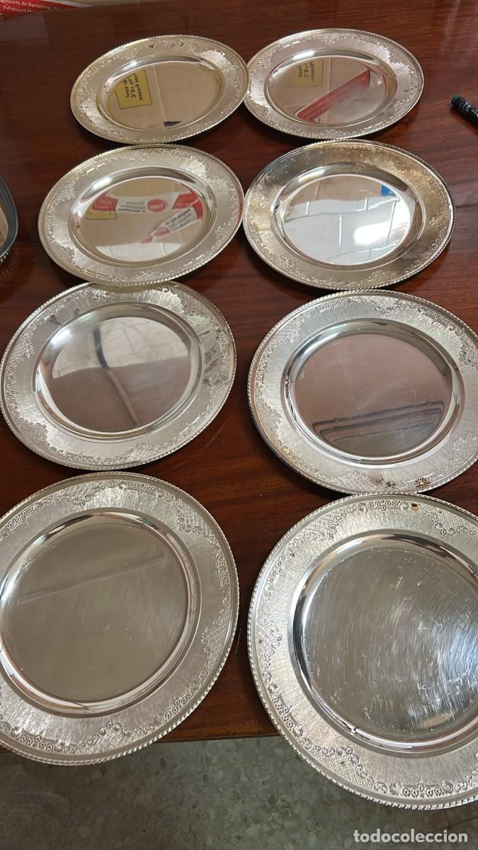 Antig&uuml;edades: PLATOS PLATEADOS 8 UDS. CON DECORACION EXTERIOR DE 30 CMS. DE DIAMETRO