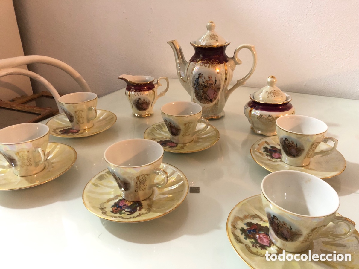Antig&uuml;edades: Juego de caf&eacute; porcelana pintado a mano