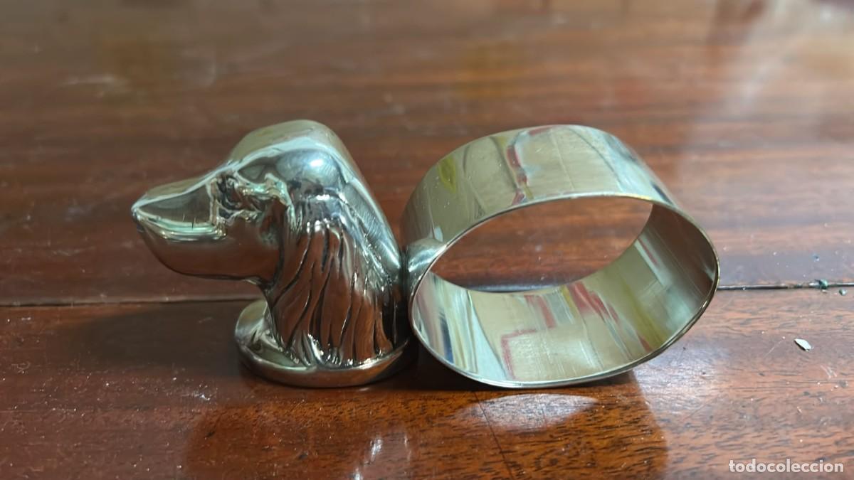 Antig&uuml;edades: SERVILLETERO PLATEADO DE 12 CMS. DE LONGITUD CON CABEZA DE PERRO