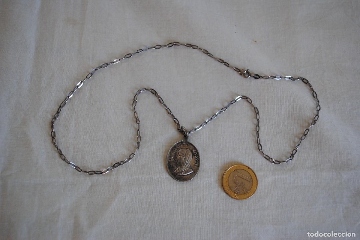 Antig&uuml;edades: CADENA Y MEDALLA DE PLATA , DEL ANGEL DE LA GUARDA Y UNA VIRGEN .