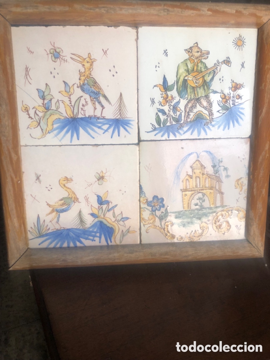 Antig&uuml;edades: panel de cuatro azulejos antiguos con personajes y arquitectura