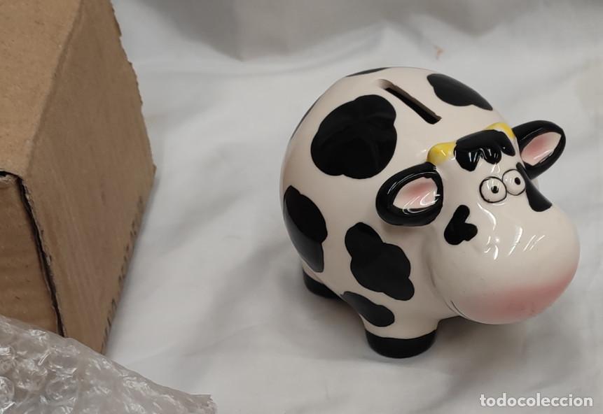 Antig&uuml;edades: HUCHA DE PORCELANA CON FORMA DE VACA