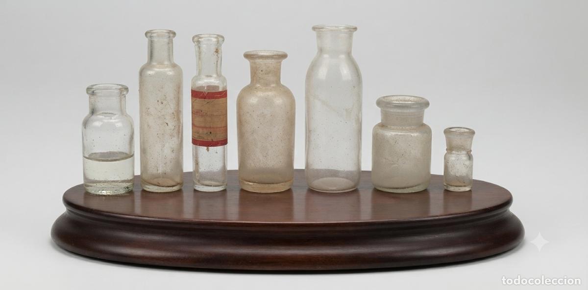 Antig&uuml;edades: Botellas antiguas de cristal (7 unidades)