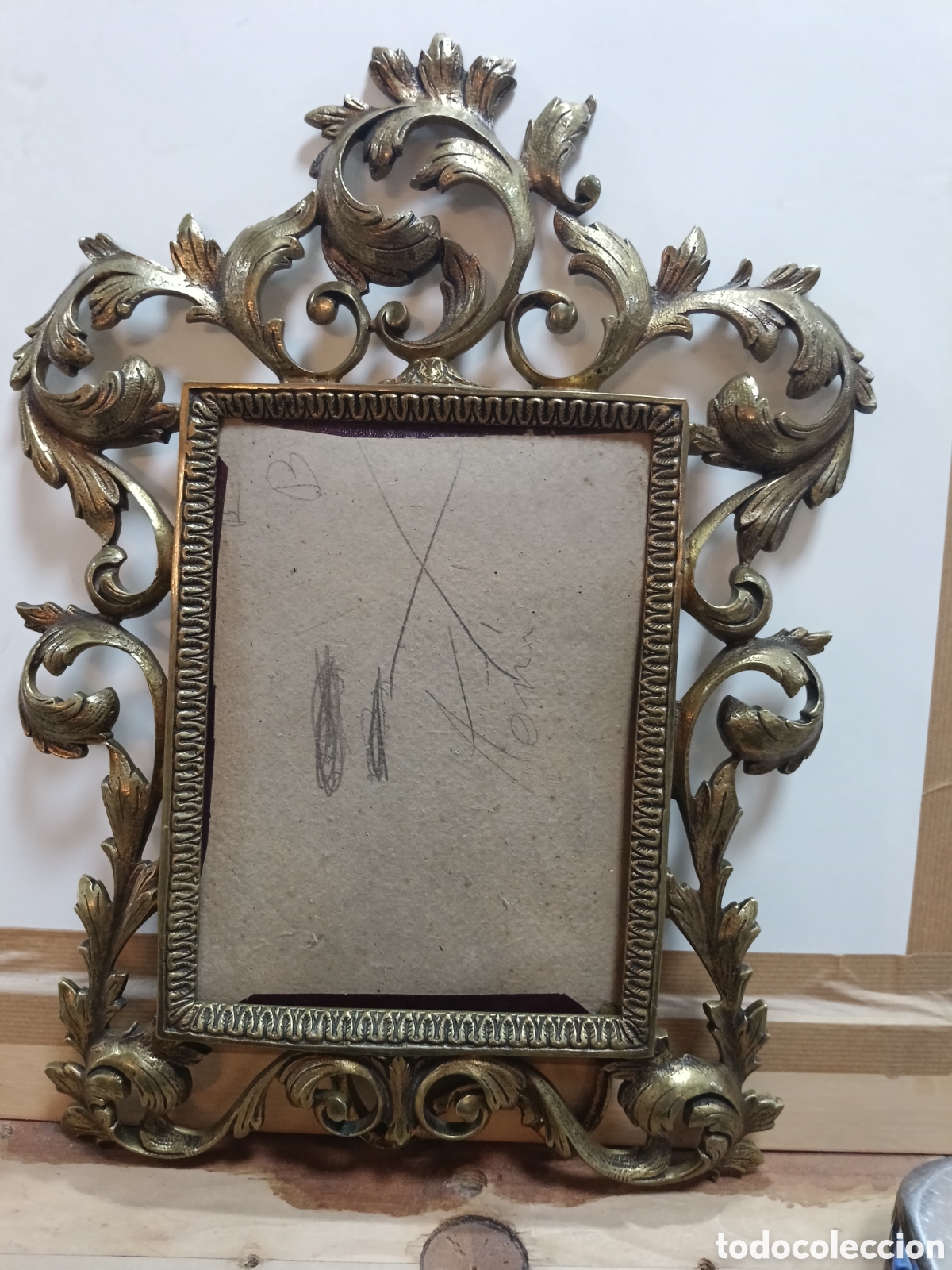 Antig&uuml;edades: Porta retrato de bronce