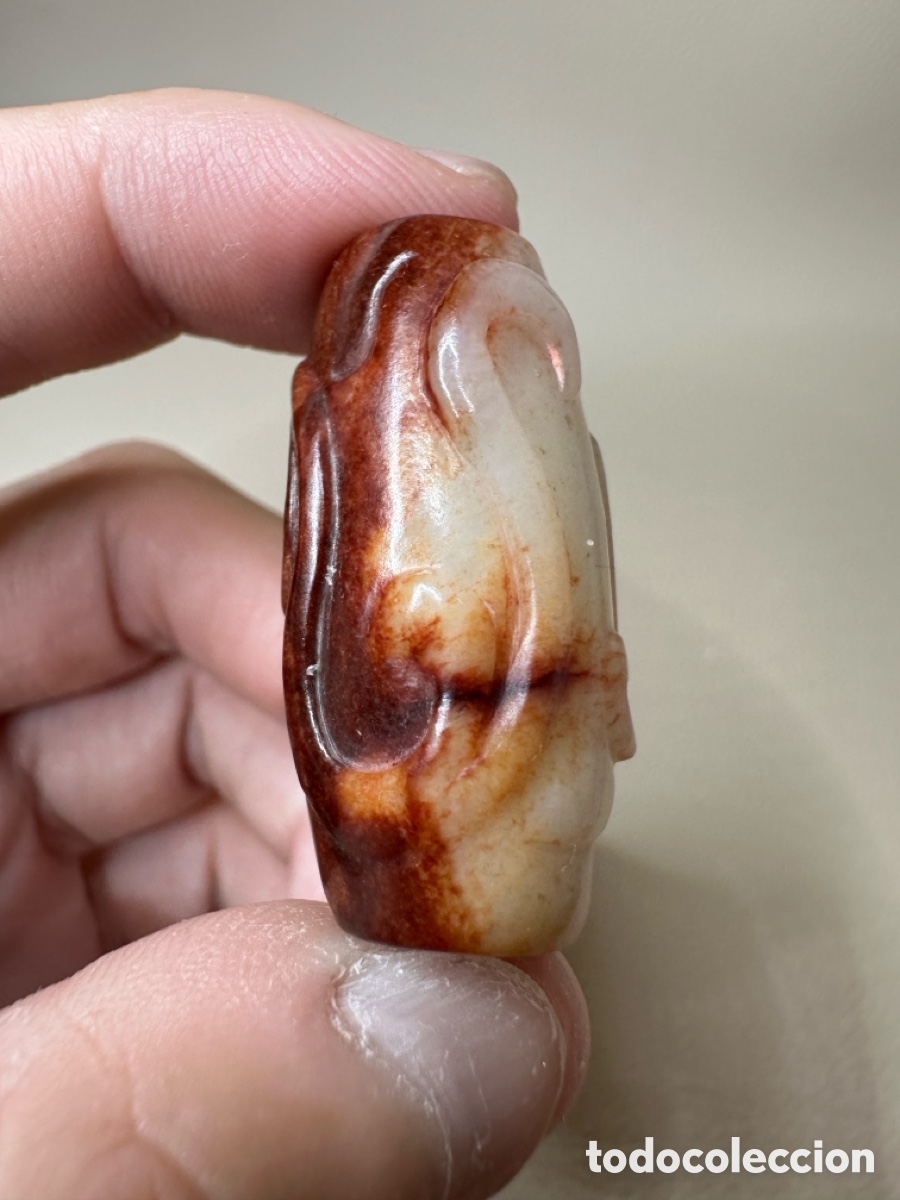 Antig&uuml;edades: Lezi de jade blanco con motivo de drag&oacute;n, dinast&iacute;a Han, China (202 a. C. - 220 d. C.)