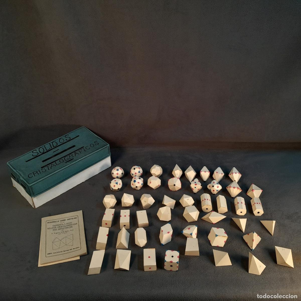 Antiguidades: CAJA DE S&Oacute;LIDOS CRISTALOGR&Aacute;FICOS DID&Aacute;CTICOS EN CARTULINA DE EUGENIO AULET SOLER. SIGLO XX.