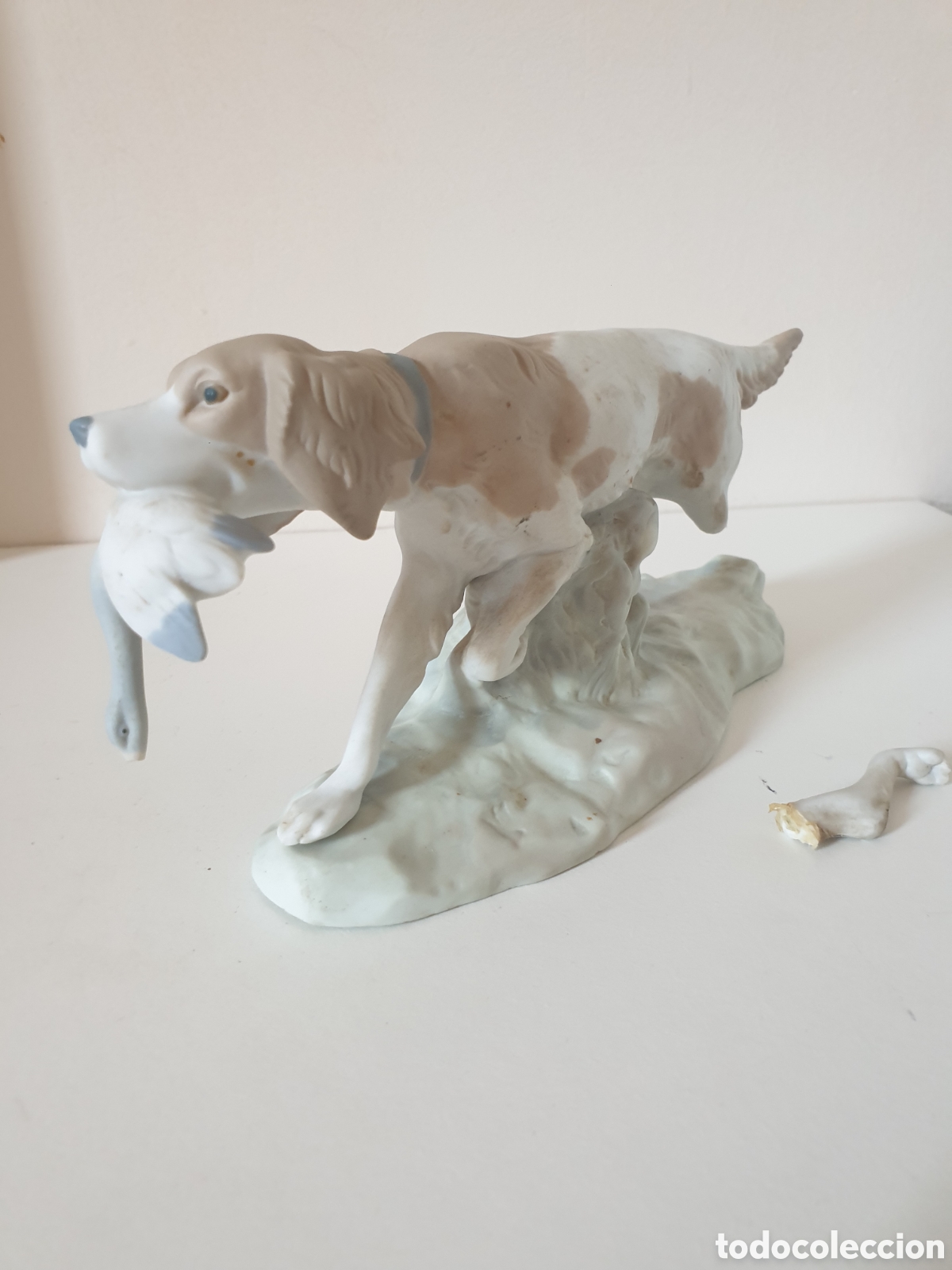 Antig&uuml;edades: Perro de caza con codorniz