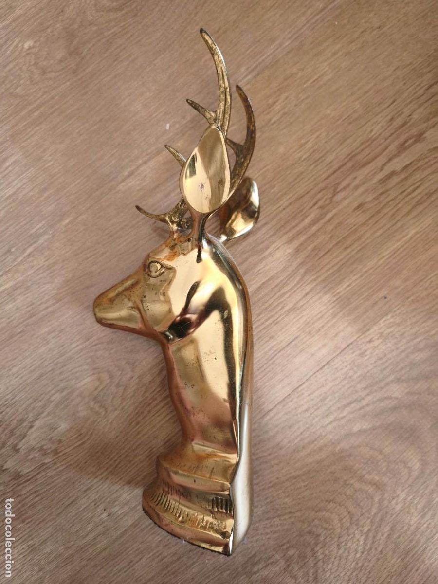 Antig&uuml;edades: estatua de bronce, cabeza de ciervo