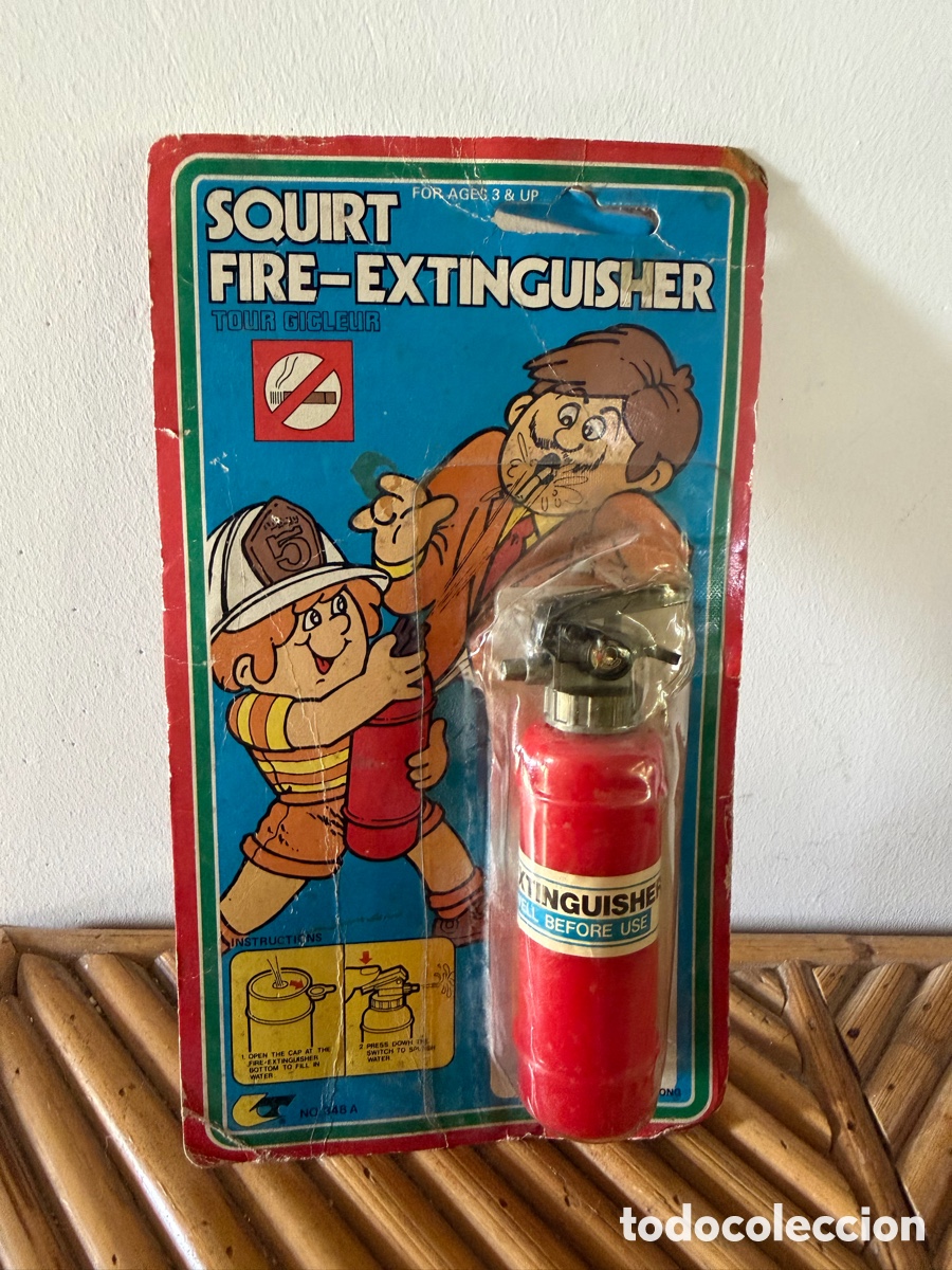 Antig&uuml;edades: Juguete antiguo squirt Fire extinguisher