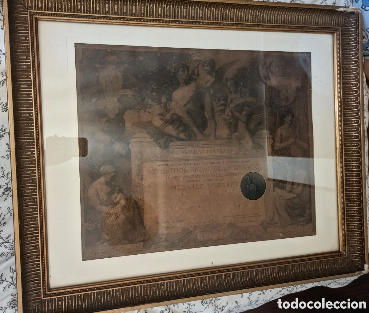 Antig&uuml;edades: Diploma y medalla de la exposici&oacute;n universal de 1900