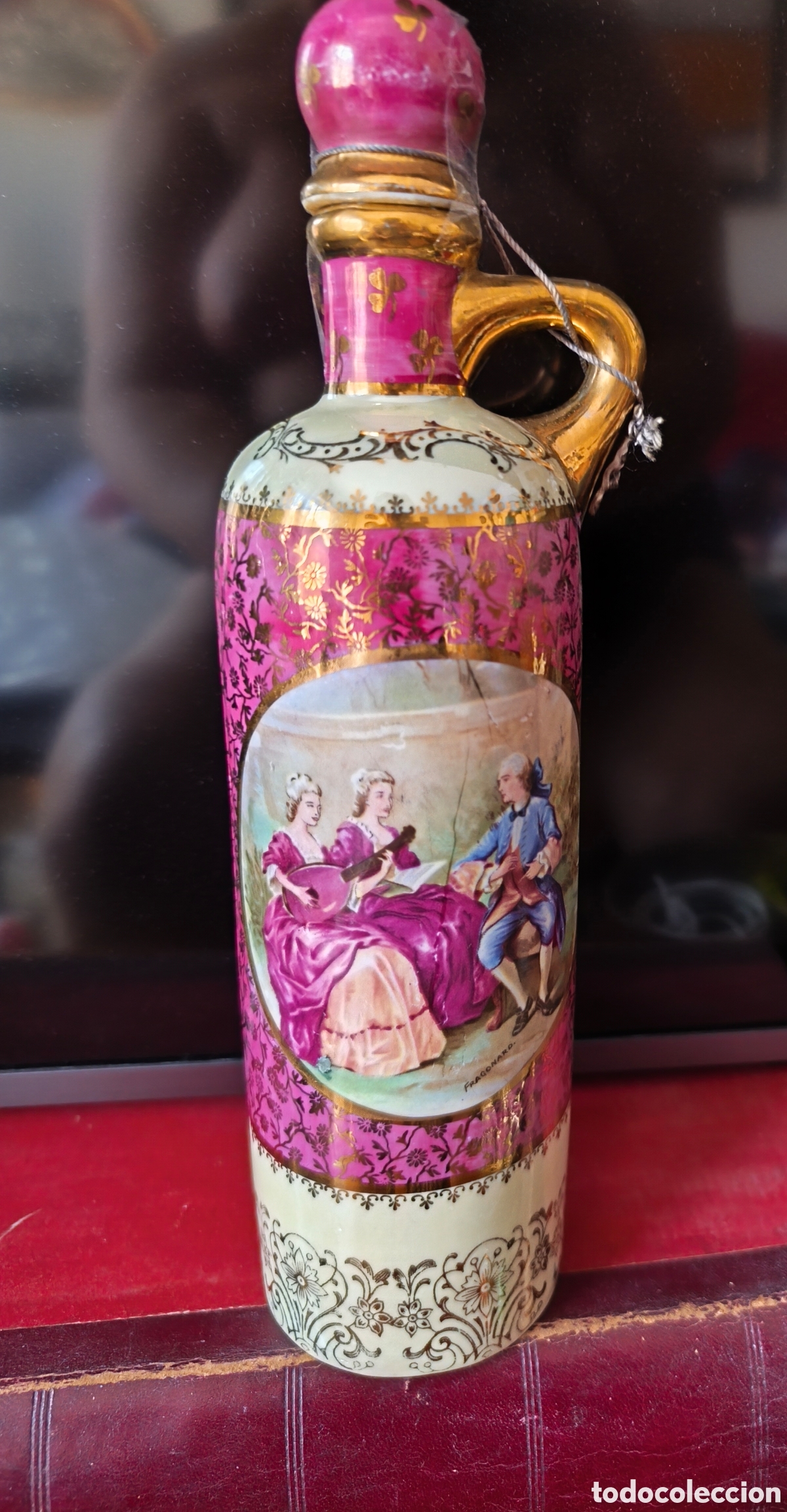 Antig&uuml;edades: Botella antigua con un dise&ntilde;o muy elaborado