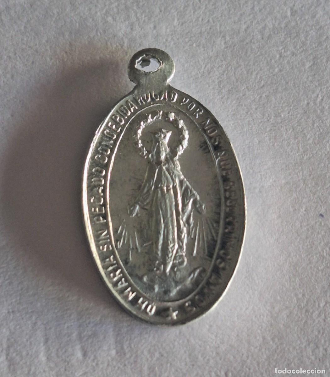 Antig&uuml;edades: Medalla metalica de la Inmaculada Concepcion