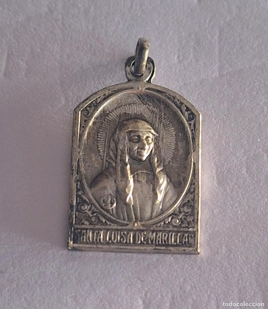 Antig&uuml;edades: Medalla metalica de Sta. Lucia y St. Vicente de Paul
