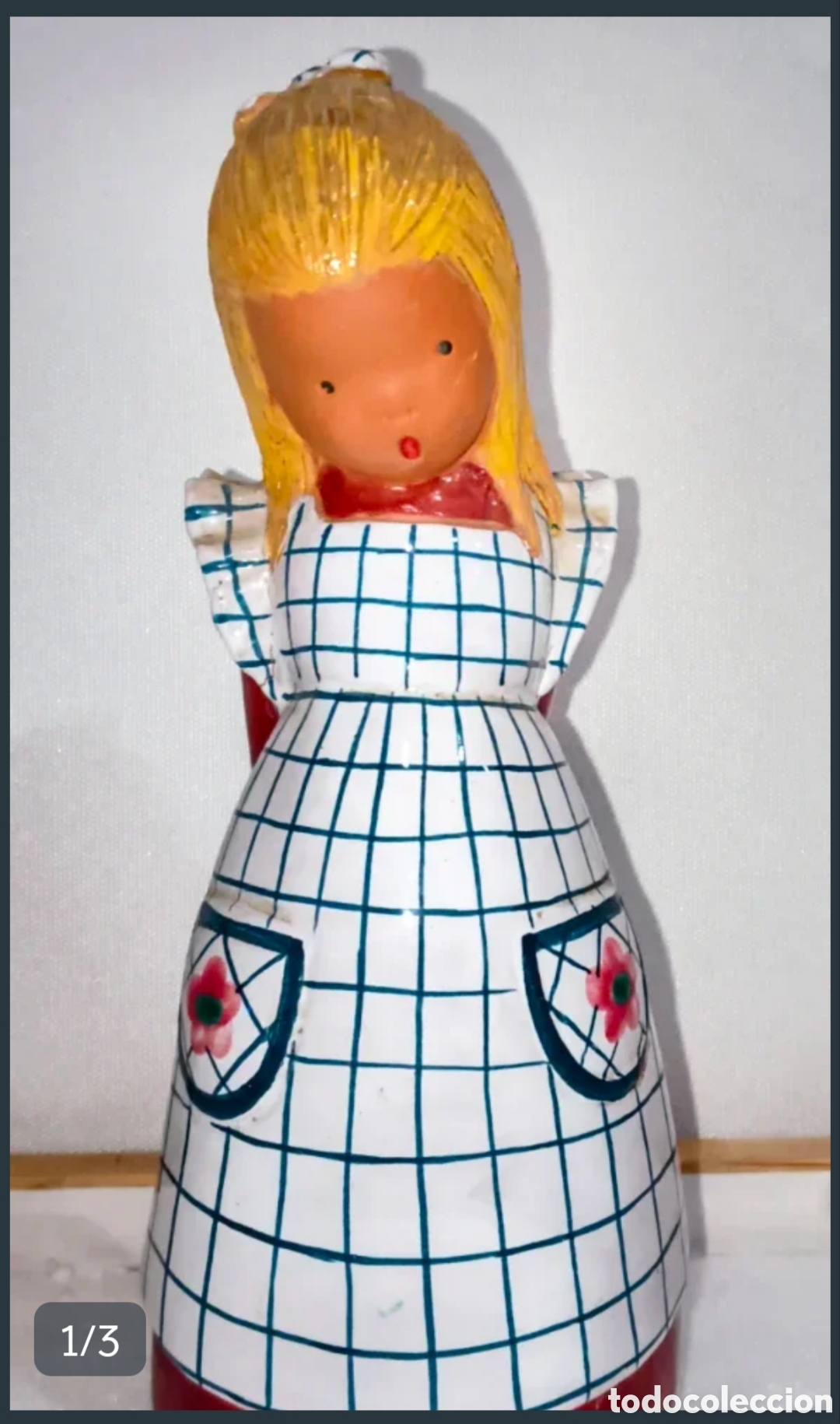 Antig&uuml;edades: Figura de cer&aacute;mica mujer delantal cuadros